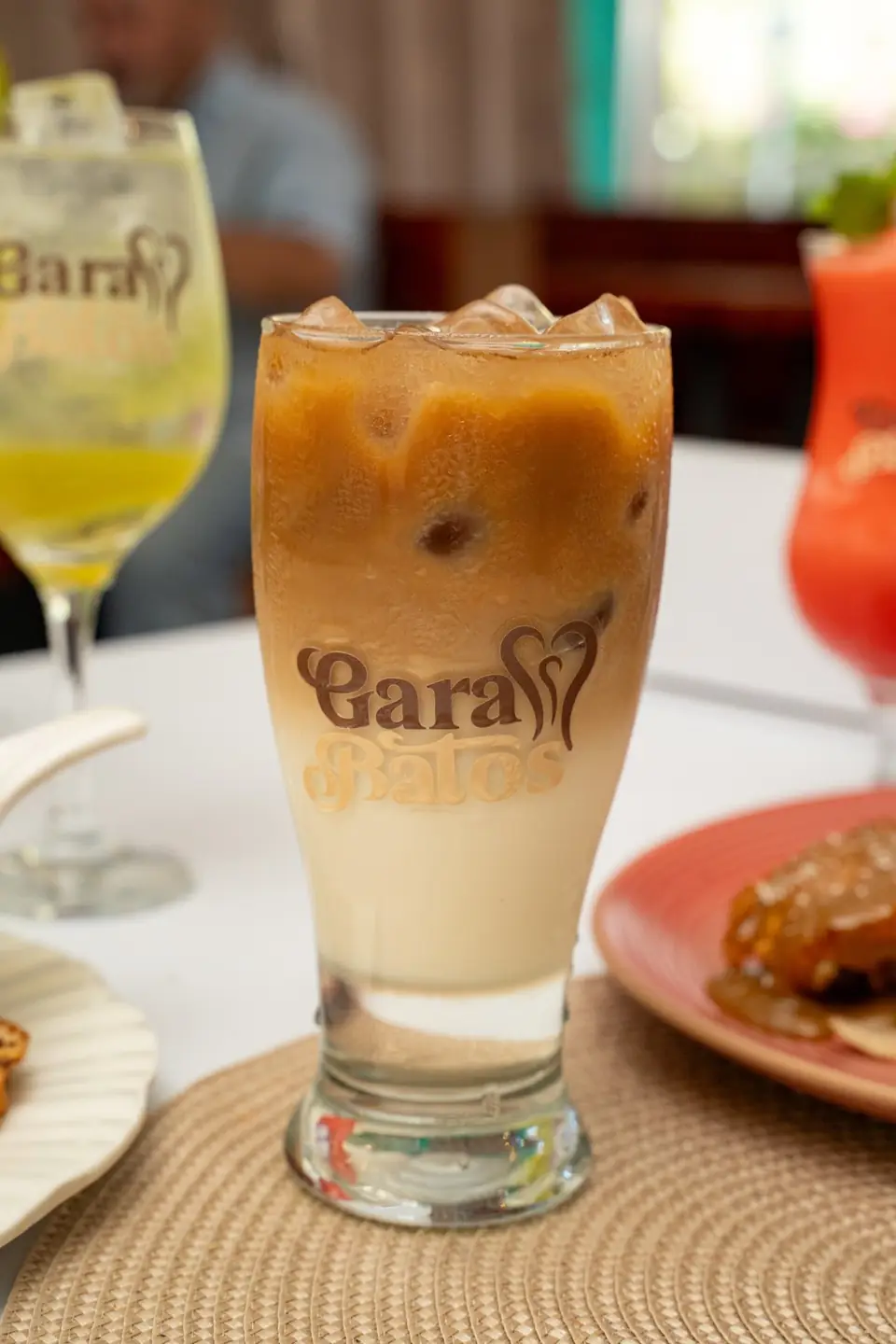 Iced latte in a Garabatos glass