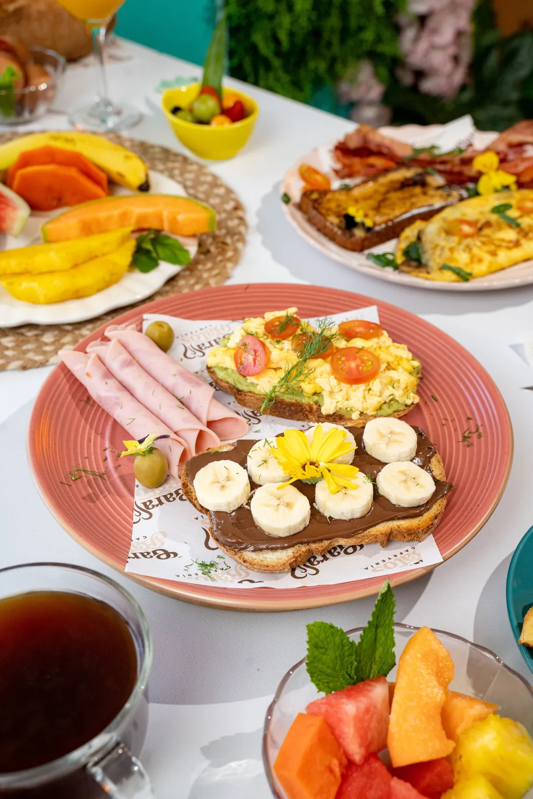 Sourdough toasts with egg, guacamole, banana and Nutella